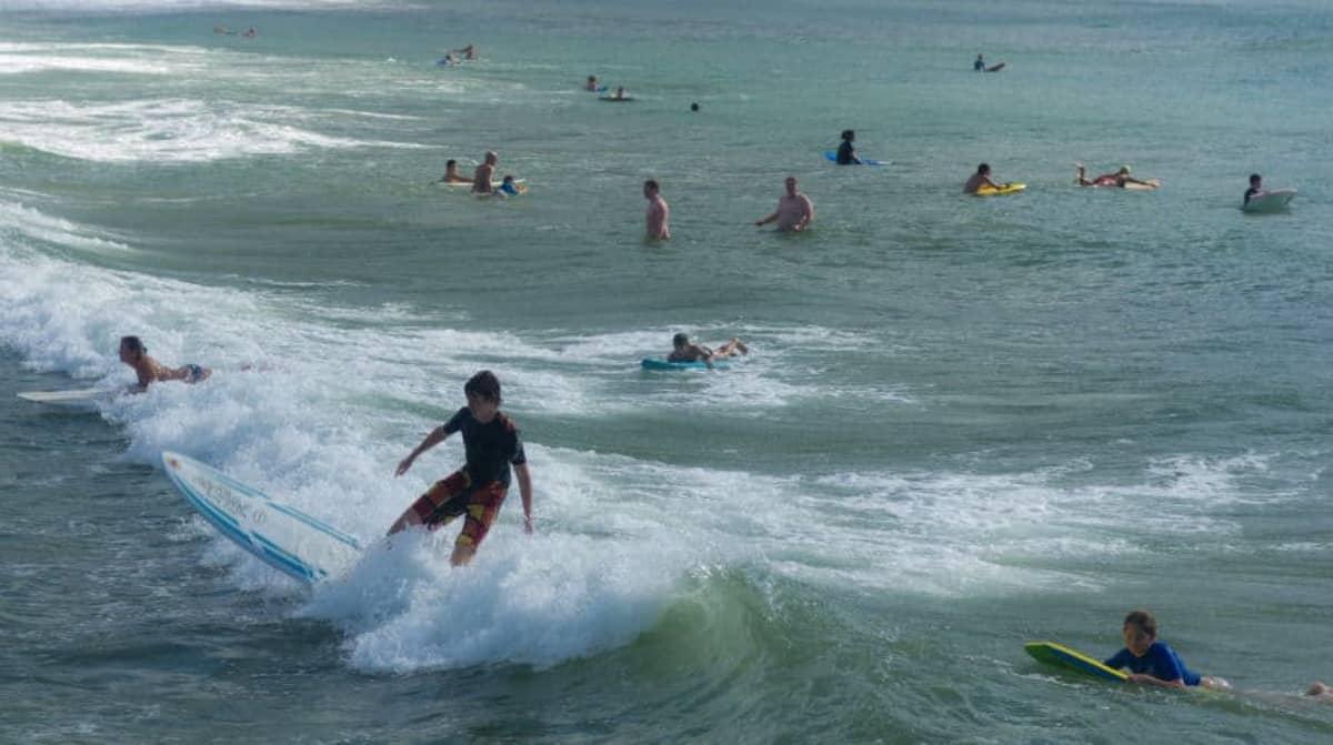 Taking surfing lessons in Kauai