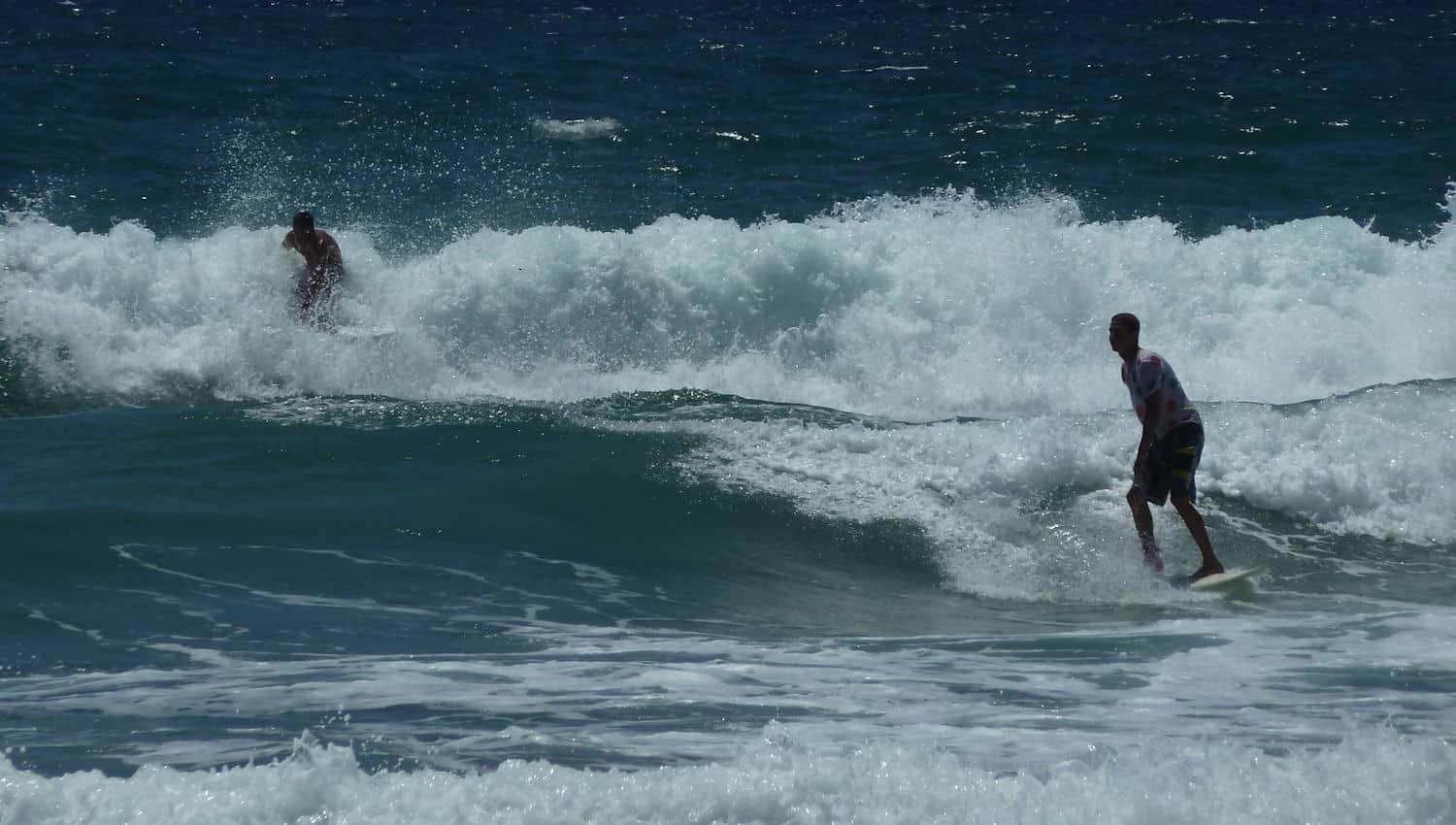 Surfing at Kealia Beach