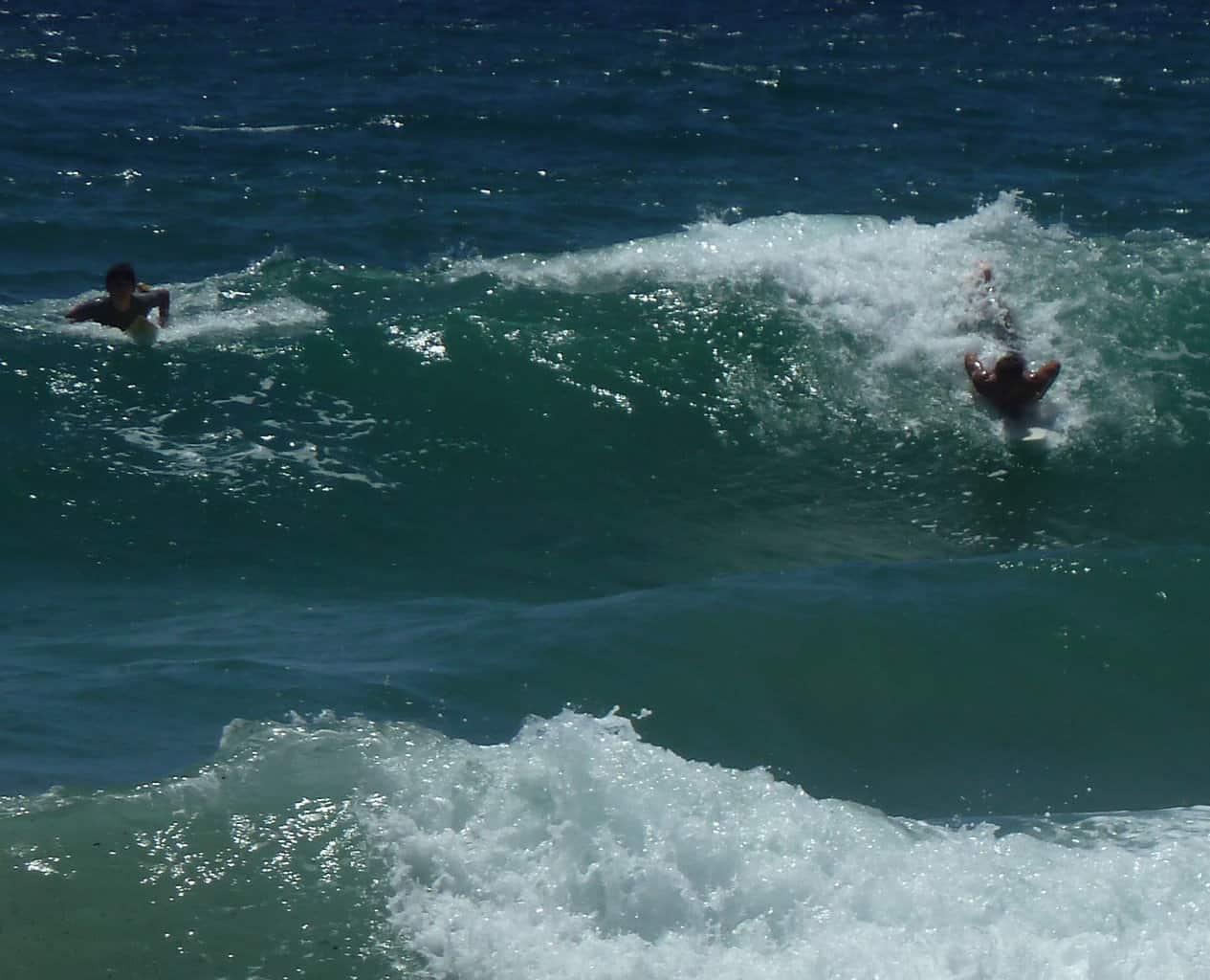 Bodyboarding at Kealia Beach